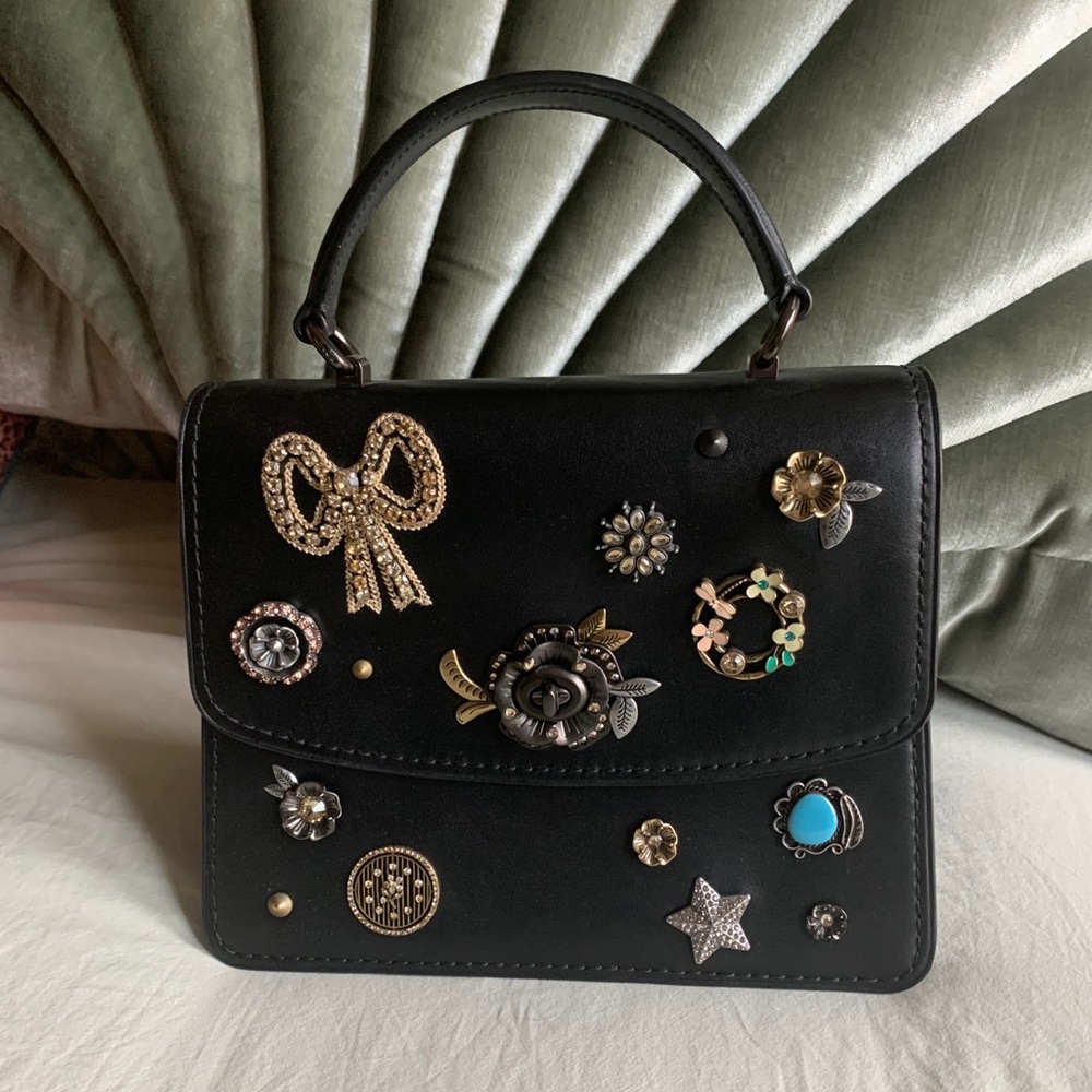 Coach top handle with embellishments